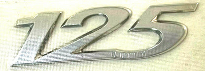TARGHETTA ADESIVA LATERALE SCUDO ORIGINALE PIAGGIO PER BEVERLY RST 125 04-07